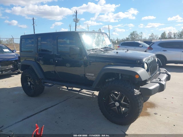 1C4BJWDG0EL311725 Jeep Wrangler Unlimited Sport