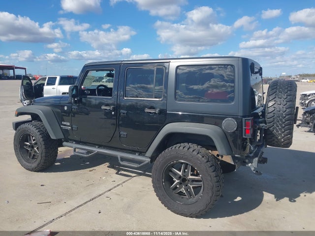 1C4BJWDG0EL311725 Jeep Wrangler Unlimited Sport