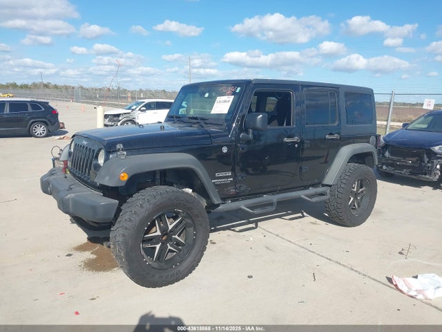 1C4BJWDG0EL311725 Jeep Wrangler Unlimited Sport