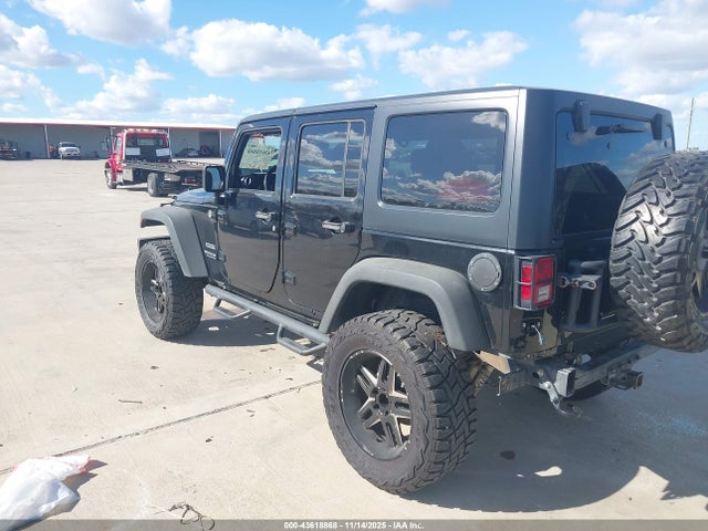 1C4BJWDG0EL311725 Jeep Wrangler Unlimited Sport