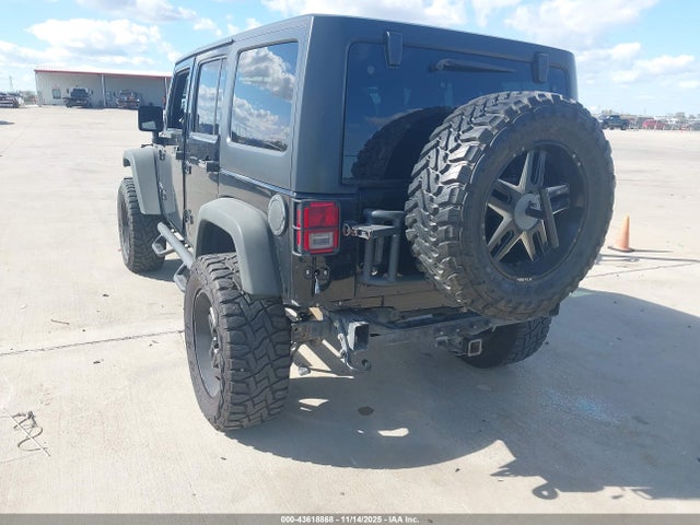 1C4BJWDG0EL311725 Jeep Wrangler Unlimited Sport
