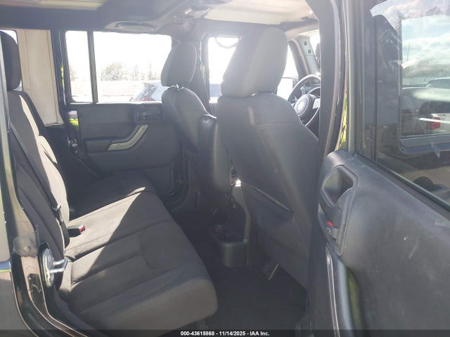 1C4BJWDG0EL311725 Jeep Wrangler Unlimited Sport