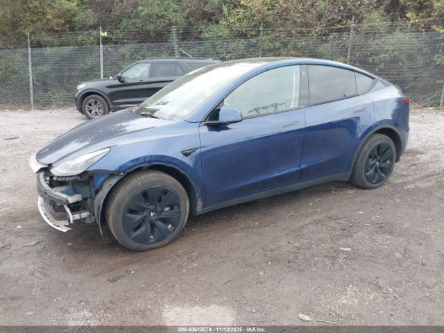2023 TESLA MODEL Y 7SAYGDEE1PF672240 Photo 1