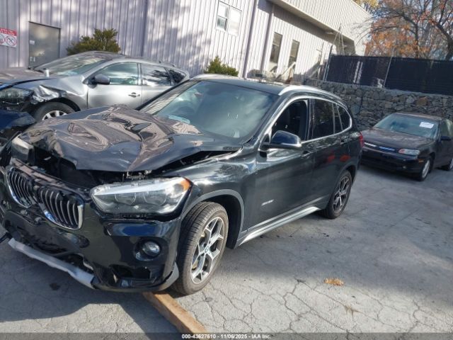 2018 BMW X1 WBXHT3C36J5F89910 Photo 1