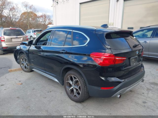 2018 BMW X1 WBXHT3C36J5F89910 Photo 2