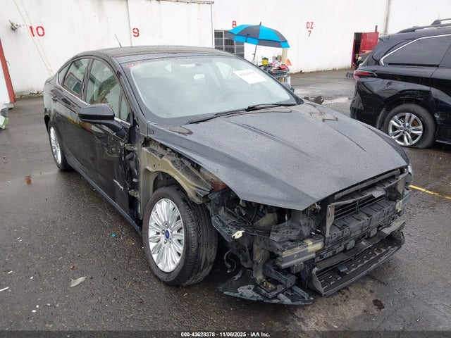 2015 FORD FUSION HYBRID 3FA6P0UU2FR137409 Photo 5