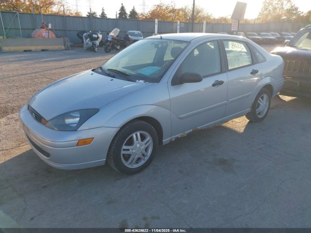 2003 FORD FOCUS 1FAFP34P73W321605 Photo 1