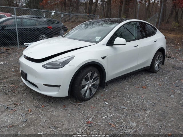 2023 TESLA MODEL Y 7SAYGAEE0PF785563 Photo 1