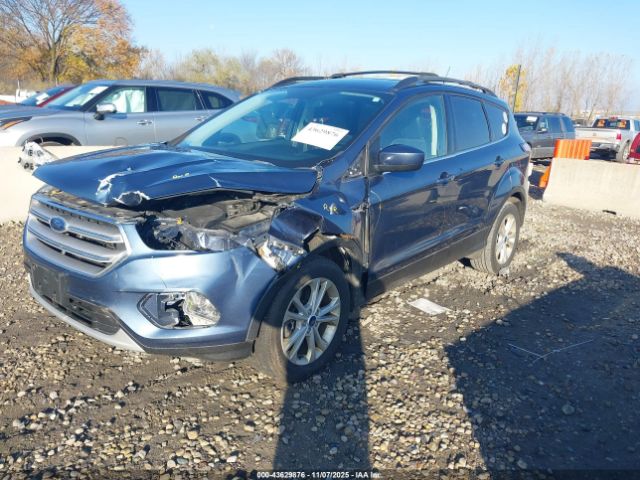 2018 FORD ESCAPE 1FMCU9HD7JUC28810 Photo 1