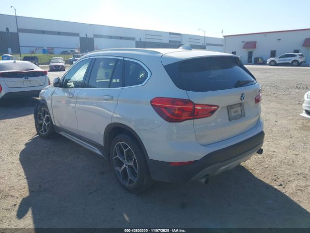 2018 BMW X1 WBXHU7C39J5H39416 Photo 2
