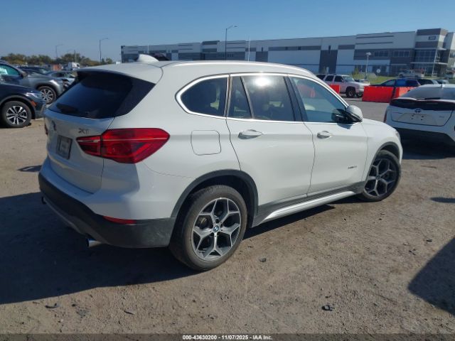 2018 BMW X1 WBXHU7C39J5H39416 Photo 3