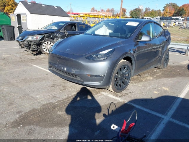 2023 TESLA MODEL Y 7SAYGAEE0PF710166 Photo 1