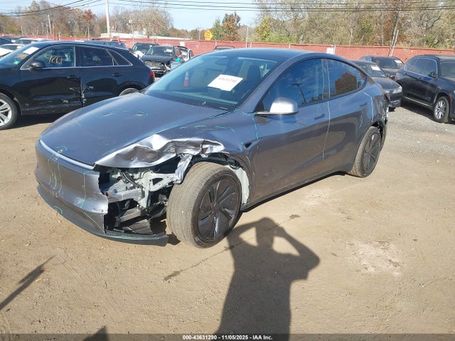 2026 TESLA MODEL Y 7SAYGDED4TA459877 Photo 1