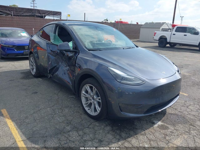 2023 TESLA MODEL Y 7SAYGDEE1PA208653 Photo 0