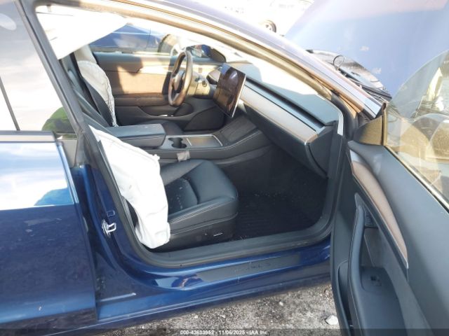 2023 TESLA MODEL 3 5YJ3E1EAXPF581153 Photo 4