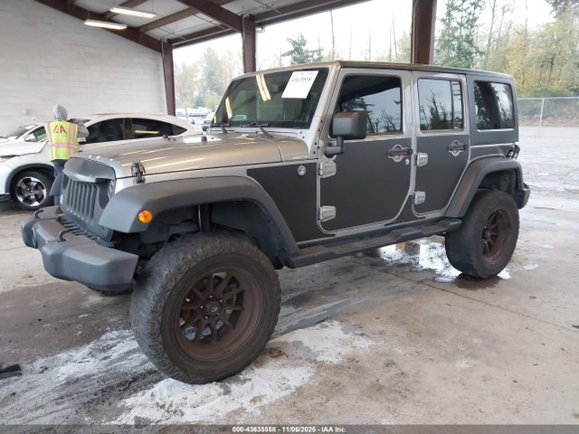 1C4HJWDGXEL190048 Jeep Wrangler Unlimited Sport