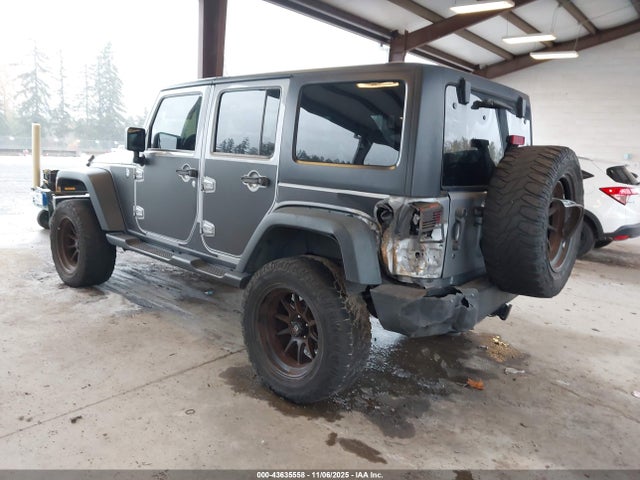 1C4HJWDGXEL190048 Jeep Wrangler Unlimited Sport