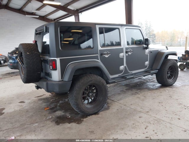 1C4HJWDGXEL190048 Jeep Wrangler Unlimited Sport