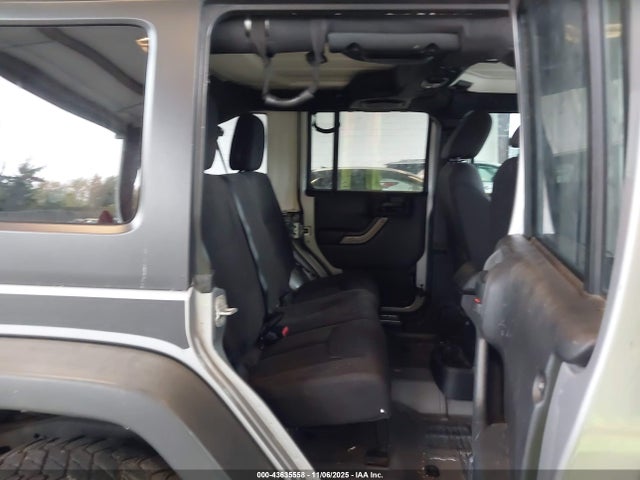 1C4HJWDGXEL190048 Jeep Wrangler Unlimited Sport
