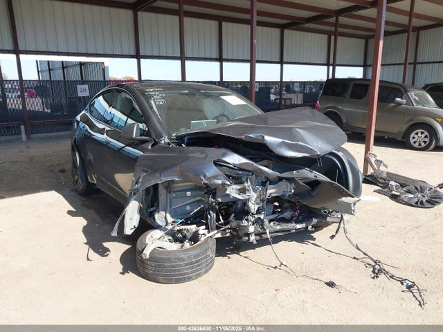 2023 TESLA MODEL Y 7SAYGDEE2PA208211 Photo 0