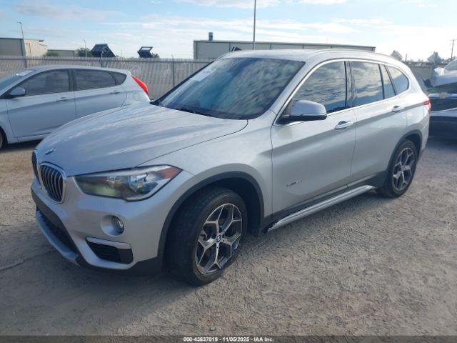 2018 BMW X1 WBXHT3C36J5K24933 Photo 1