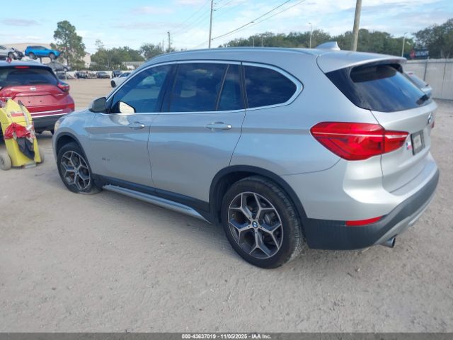 2018 BMW X1 WBXHT3C36J5K24933 Photo 2