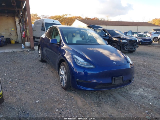 2023 TESLA MODEL Y 7SAYGDEE6PF618402 Photo 0