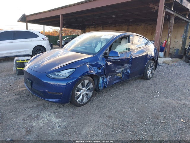 2023 TESLA MODEL Y 7SAYGDEE6PF618402 Photo 1