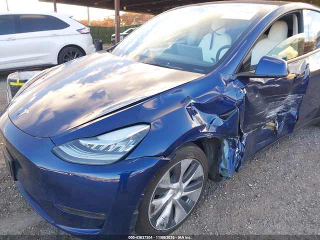 2023 TESLA MODEL Y 7SAYGDEE6PF618402 Photo 5