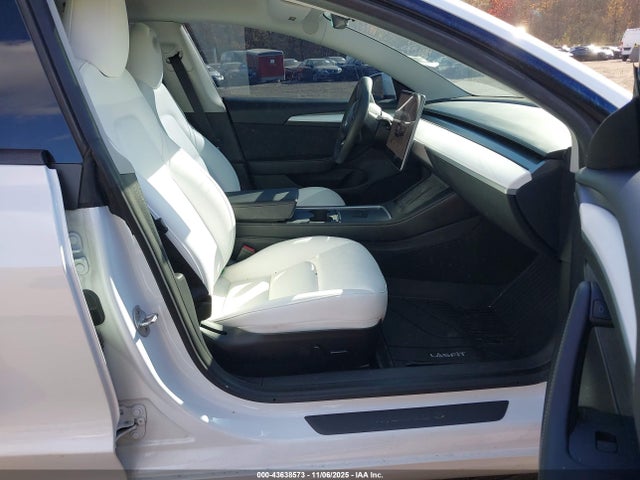 2023 TESLA MODEL 3 5YJ3E1EAXPF551442 Photo 4