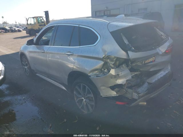 2017 BMW X1 WBXHT3C34H5F81864 Photo 2