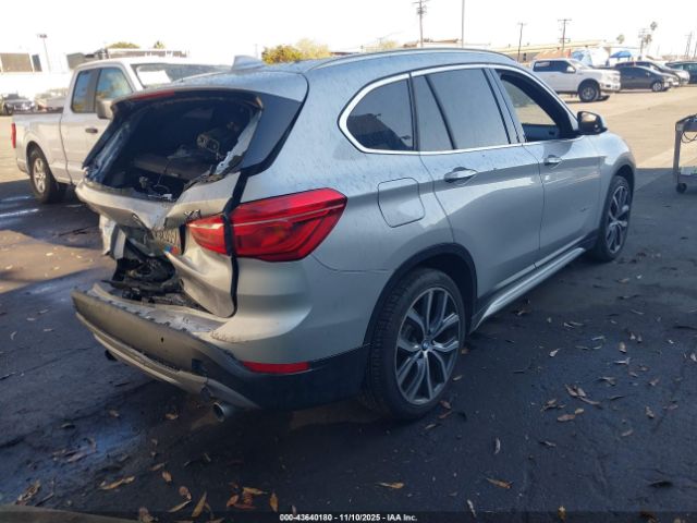 2017 BMW X1 WBXHT3C34H5F81864 Photo 3