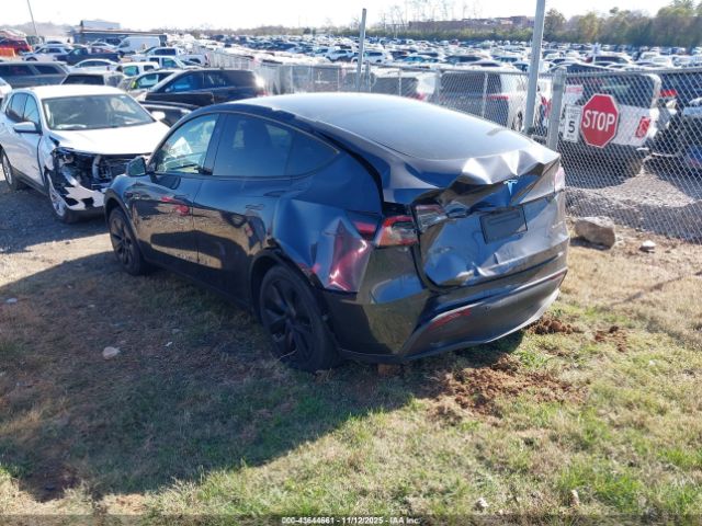 2025 TESLA MODEL Y 7SAYGDEE0SA340344 Photo 2