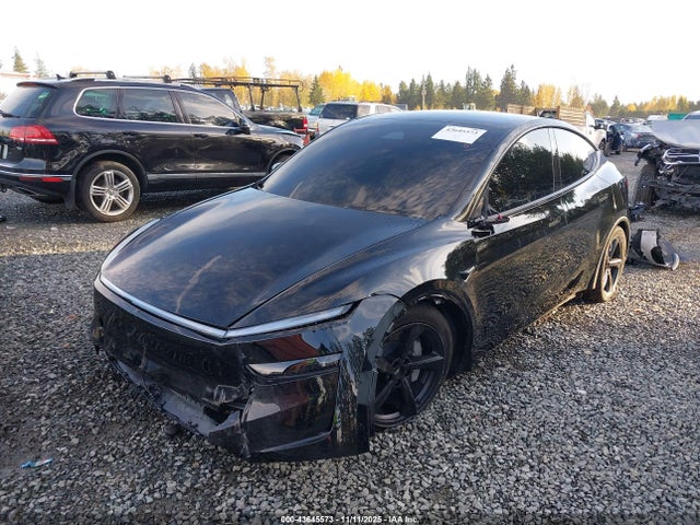 2026 TESLA MODEL Y 7SAYGDED2TF389590 Photo 1