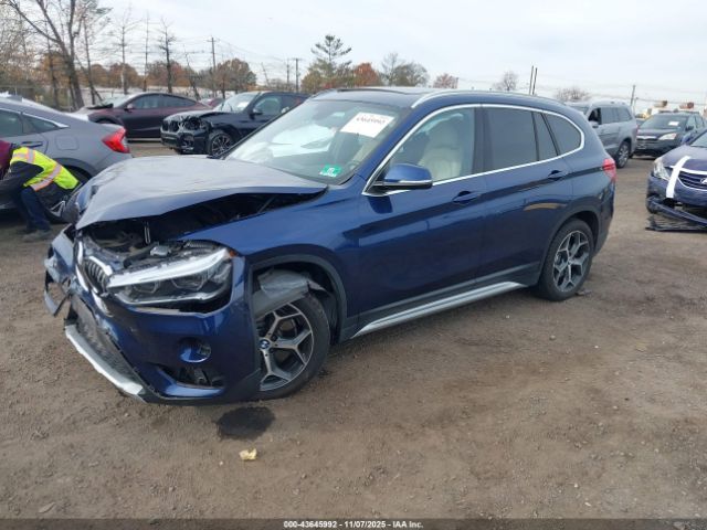 2018 BMW X1 WBXHT3C34J5L32631 Photo 1