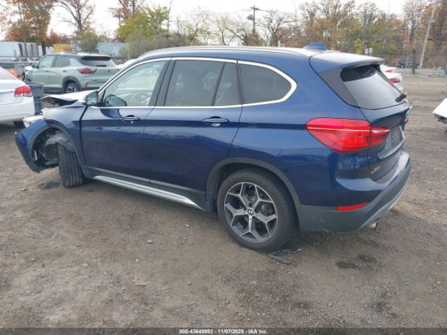 2018 BMW X1 WBXHT3C34J5L32631 Photo 2