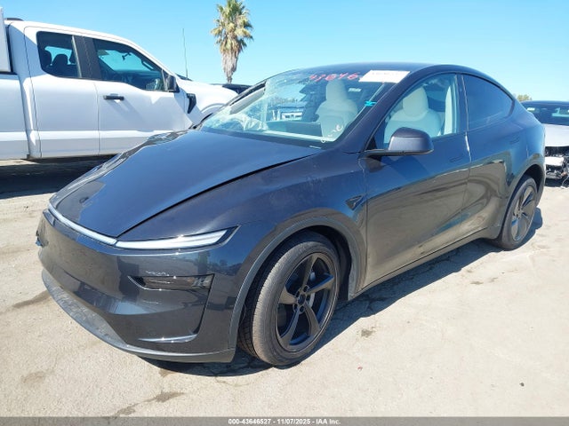 2026 TESLA MODEL Y 7SAYGDEE9TF455061 Photo 1
