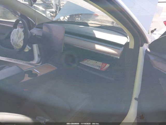 2023 TESLA MODEL Y 7SAYGAEE5PF596536 Photo 4