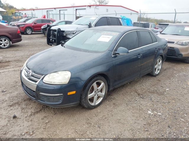 2009 VOLKSWAGEN JETTA 3VWRL71K59M126790 Photo 1