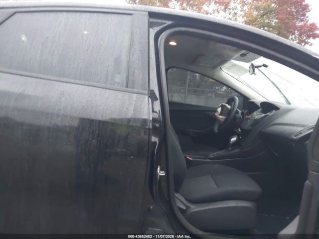 2015 FORD FOCUS 1FADP3E28FL383224 Photo 4