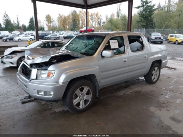 2011 HONDA RIDGELINE 5FPYK1F59BB006395 Photo 1