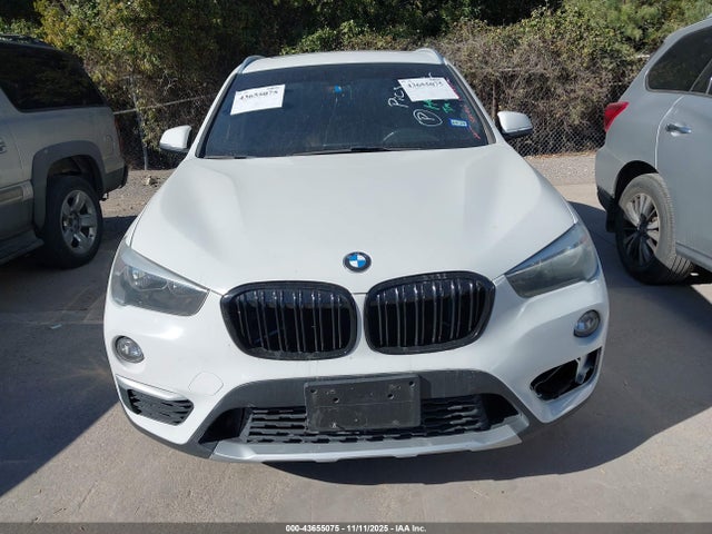 WBXHU7C37J5H42458 BMW X1