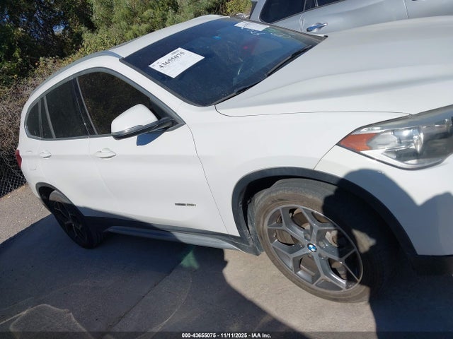 WBXHU7C37J5H42458 BMW X1
