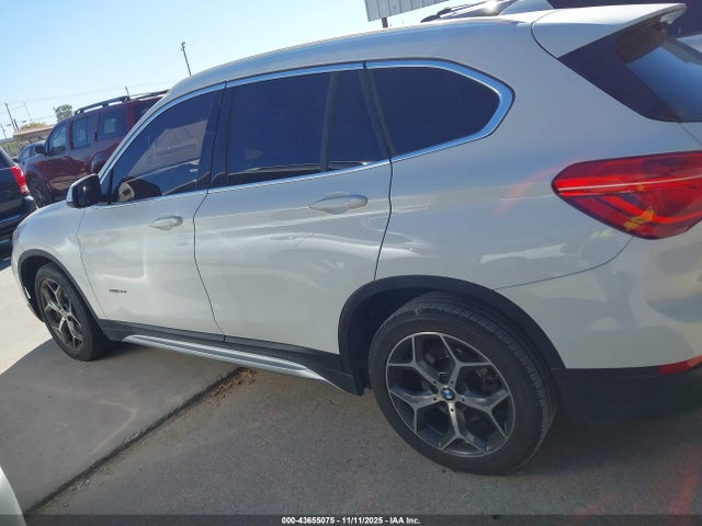 WBXHU7C37J5H42458 BMW X1