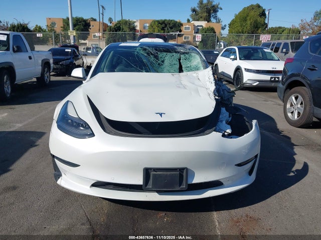 Продажа на аукционе авто 2022 Tesla Model 3 Rear-wheel Drive, vin: 5YJ3E1EAXNF191151, номер лота: 43657636