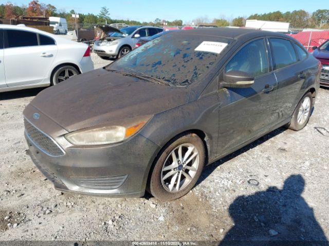 2015 FORD FOCUS 1FADP3F20FL206598 Photo 1