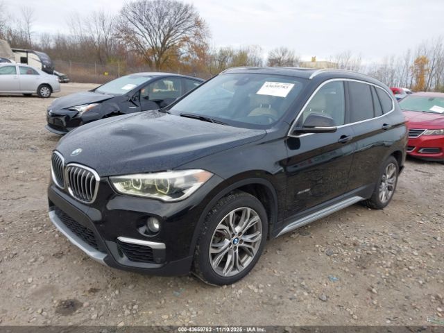 2016 BMW X1 WBXHT3C33GP883193 Photo 1