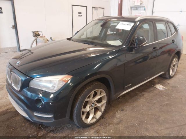 2013 BMW X1 WBAVL1C57DVR89009 Photo 1