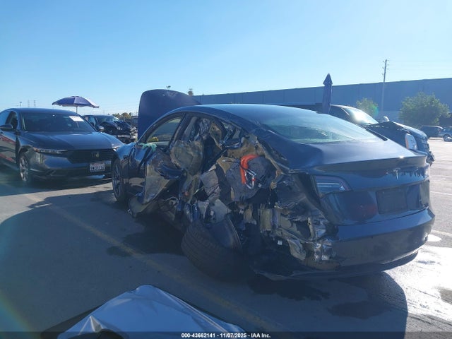 2021 TESLA MODEL 3 5YJ3E1EB0MF999077 Photo 2