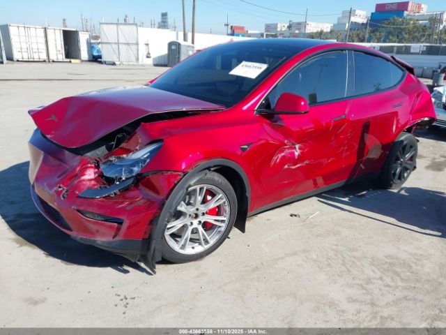 2024 TESLA MODEL Y 7SAYGDEE6RF064717 Photo 1